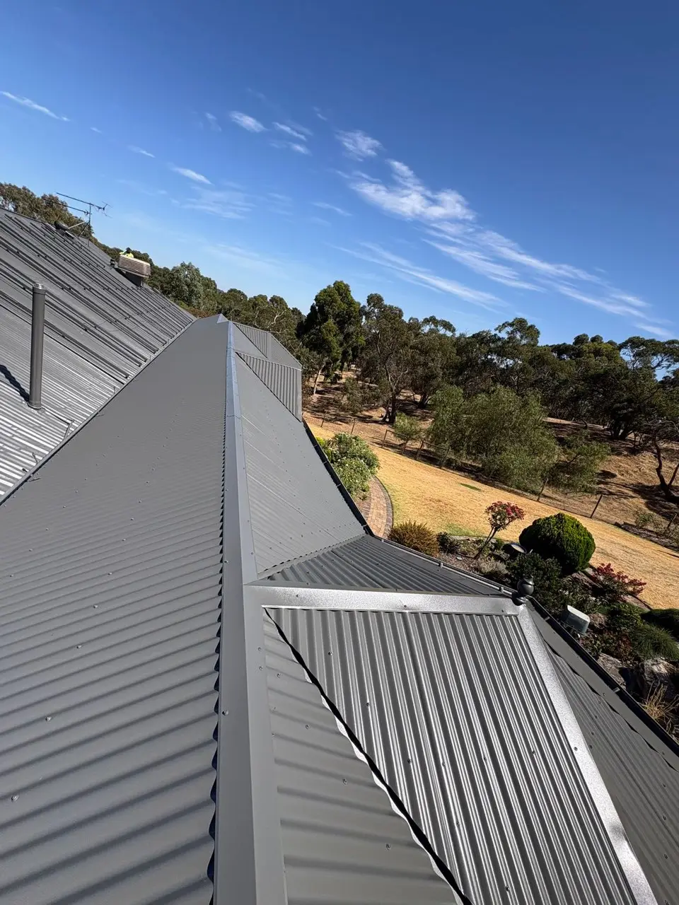 New Colorbond hip and valley roof overlooking Adelaide foothills